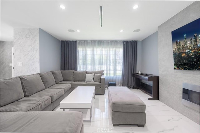 11118 Haskell Ave, Granada Hills, CA 91344 - living area with recessed lighting, light marble finish floors, and a glass covered fireplace
