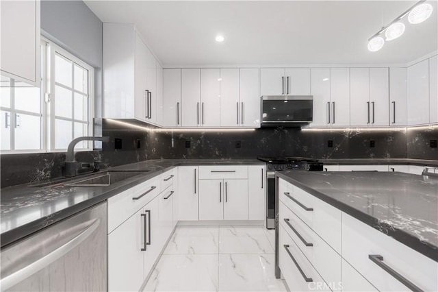 11118 Haskell Ave, Granada Hills, CA 91344 - kitchen with appliances with stainless steel finishes, light marble finish floors, white cabinets, backsplash, and recessed lighting