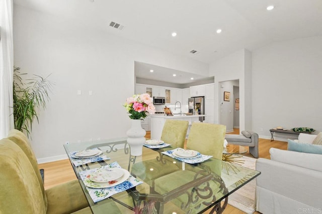 12639 Elizabeth Way, San Diego, CA 92129 - dining space featuring light wood-style flooring and recessed lighting