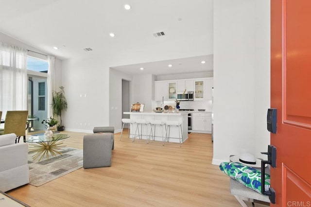 12639 Elizabeth Way, San Diego, CA 92129 - living area with light wood-style floors and recessed lighting