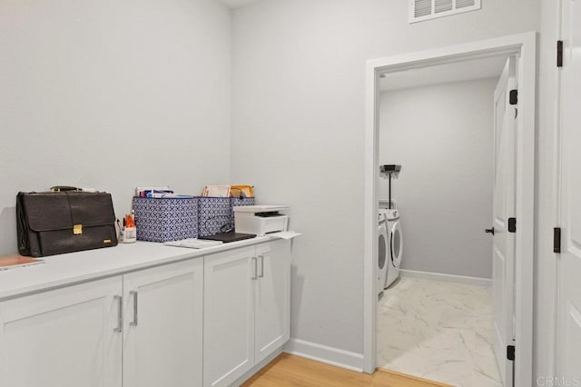 12639 Elizabeth Way, San Diego, CA 92129 - laundry area featuring washer and dryer and light marble finish floors