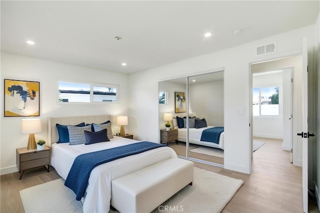 4561 Beverly Ct, Riverside, CA 92506 - bedroom with light wood-style floors, a closet, and recessed lighting