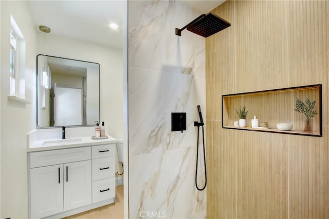 4561 Beverly Ct, Riverside, CA 92506 - full bathroom featuring vanity and a marble finish shower