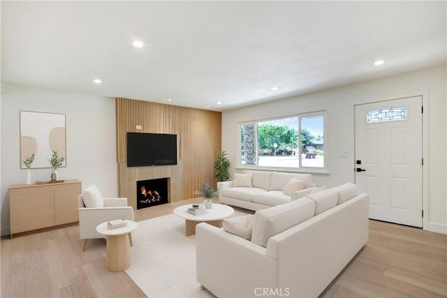 4561 Beverly Ct, Riverside, CA 92506 - living area featuring recessed lighting, light wood-type flooring, and a fireplace