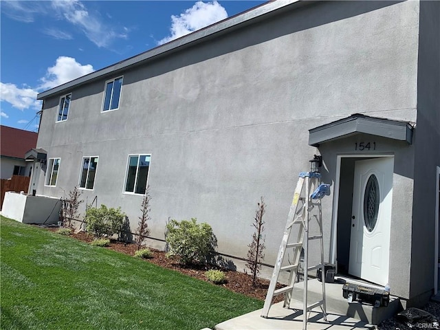 1539 112th St, Los Angeles, CA 90059 - view of home's exterior with stucco siding