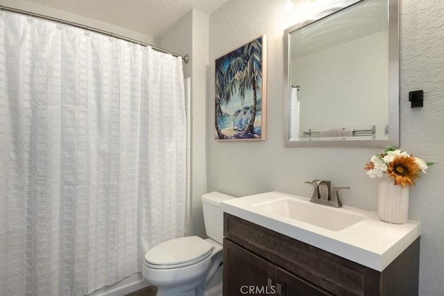 10151 Arrow Unit 140, Rancho Cucamonga, CA 91730 - full bath featuring a textured wall, vanity, and a shower with shower curtain