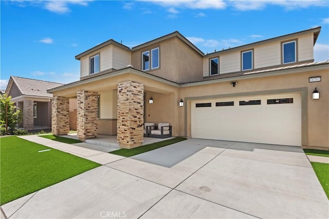 16707 Island Oak St, Fontana, CA 92336 - view of front facade with an attached garage, stucco siding, driveway, and a porch
