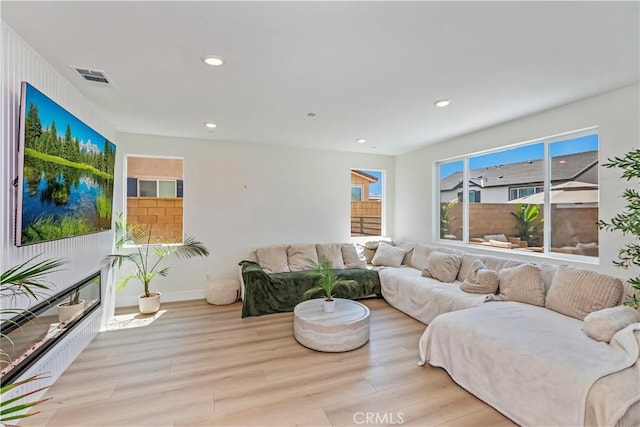 16707 Island Oak St, Fontana, CA 92336 - living area with wood finished floors and recessed lighting