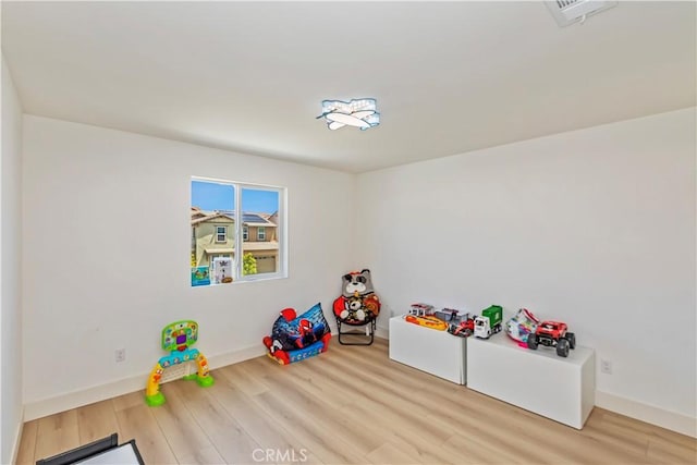 16707 Island Oak St, Fontana, CA 92336 - rec room with wood finished floors