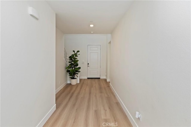 16707 Island Oak St, Fontana, CA 92336 - corridor with light wood finished floors and baseboards