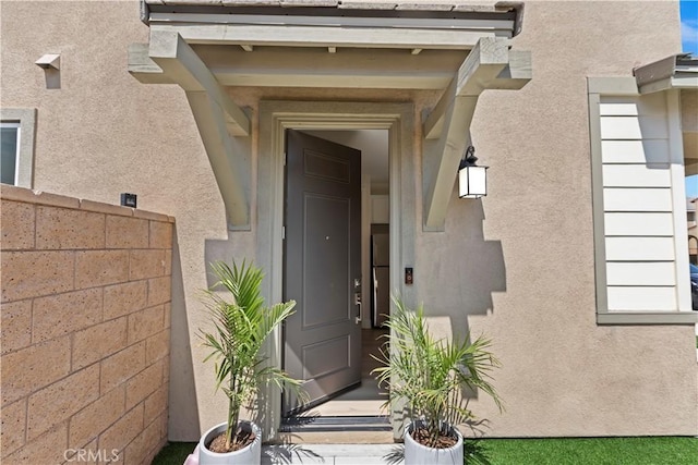 16707 Island Oak St, Fontana, CA 92336 - entrance to property featuring stucco siding