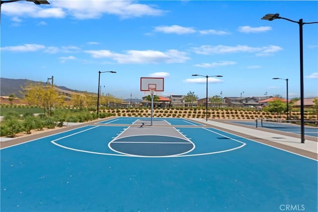 16707 Island Oak St, Fontana, CA 92336 - view of basketball court featuring community basketball court and a mountain view
