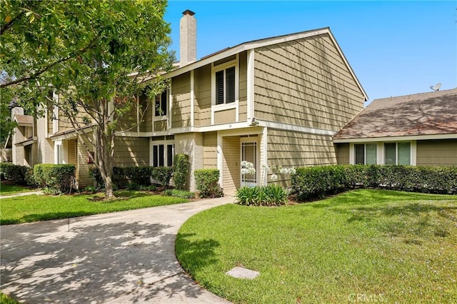14 Black Oak, Irvine, CA 92604 - view of front of house featuring a front lawn and a chimney