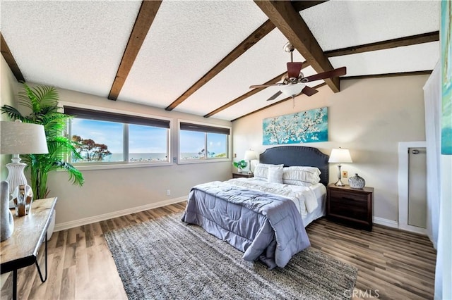 15 Vista Del Ponto Unit 70, San Clemente, CA 92672 - bedroom featuring a textured ceiling, wood finished floors, and ceiling fan