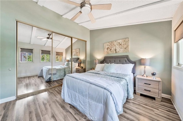 15 Vista Del Ponto Unit 70, San Clemente, CA 92672 - bedroom featuring wood finished floors, a ceiling fan, and a closet