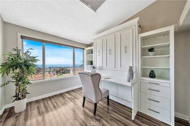 15 Vista Del Ponto Unit 70, San Clemente, CA 92672 - office area featuring wood finished floors and a textured ceiling