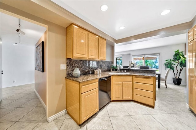 15 Vista Del Ponto Unit 70, San Clemente, CA 92672 - kitchen featuring dishwasher, a peninsula, light tile patterned floors, backsplash, and dark stone countertops