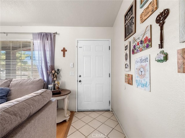 11671 Mountain Rd, Pinon Hills, CA 92372 - entrance foyer with light tile patterned floors
