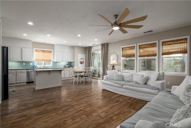 3455 Sugar Maple Ct, Hemet, CA 92545 - living area featuring ceiling fan, plenty of natural light, dark wood-style flooring, and recessed lighting