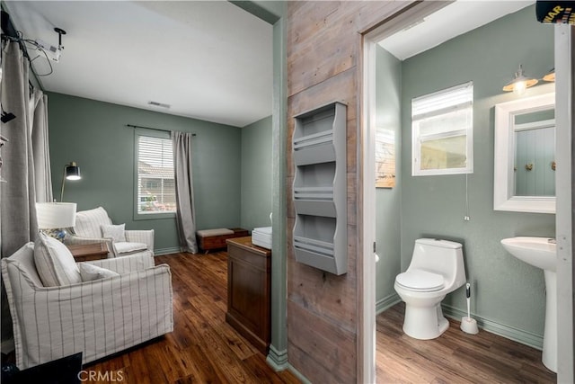3455 Sugar Maple Ct, Hemet, CA 92545 - bathroom with wood finished floors and toilet