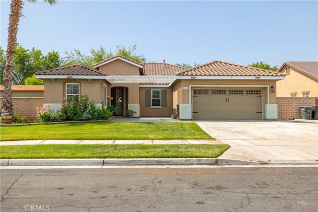 3455 Sugar Maple Ct, Hemet, CA 92545 - mediterranean / spanish-style home with an attached garage, stucco siding, concrete driveway, and a tiled roof