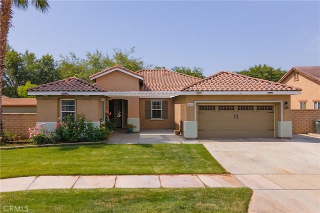 3455 Sugar Maple Ct, Hemet, CA 92545 - mediterranean / spanish-style house with stucco siding, an attached garage, and concrete driveway