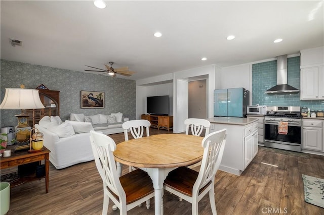 3455 Sugar Maple Ct, Hemet, CA 92545 - dining area featuring wallpapered walls, a ceiling fan, dark wood-type flooring, and recessed lighting