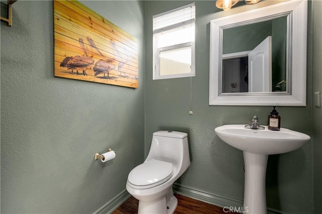 3455 Sugar Maple Ct, Hemet, CA 92545 - bathroom with baseboards and wood finished floors