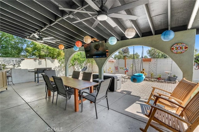 6320 Rancho Rio Rd, Paramount, CA 90723 - fenced backyard featuring outdoor dining area, a ceiling fan, and a patio area