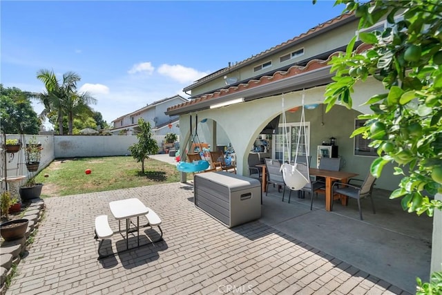 6320 Rancho Rio Rd, Paramount, CA 90723 - fenced backyard with a patio and outdoor dining space