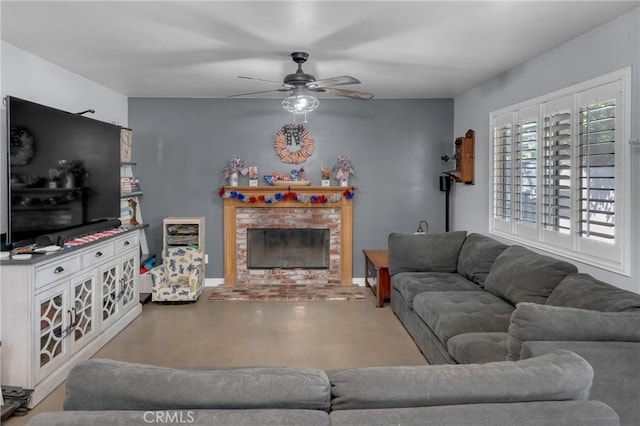6320 Rancho Rio Rd, Paramount, CA 90723 - living area featuring ceiling fan, a fireplace, and finished concrete flooring