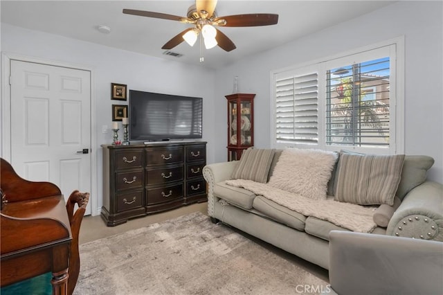 6320 Rancho Rio Rd, Paramount, CA 90723 - living area featuring a ceiling fan and light carpet