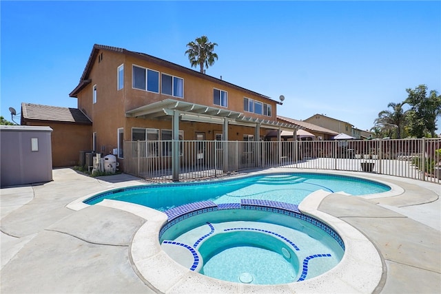 35887 Rhone Ln, Winchester, CA 92596 - view of pool featuring a pergola, a pool with connected hot tub, and a patio area