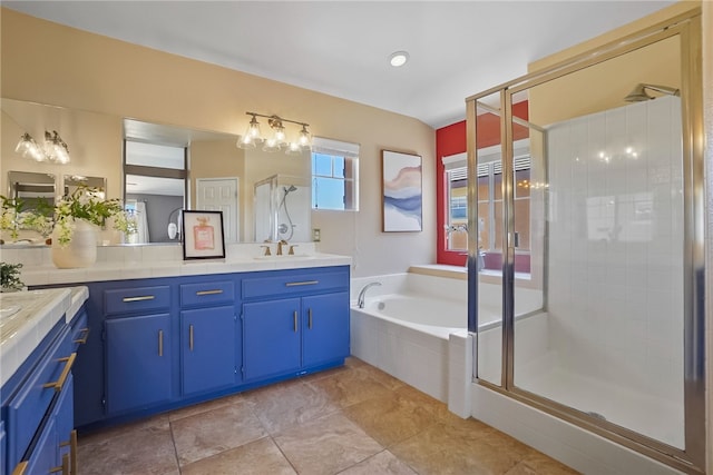 35887 Rhone Ln, Winchester, CA 92596 - full bathroom with double vanity, a stall shower, a garden tub, and tile patterned flooring