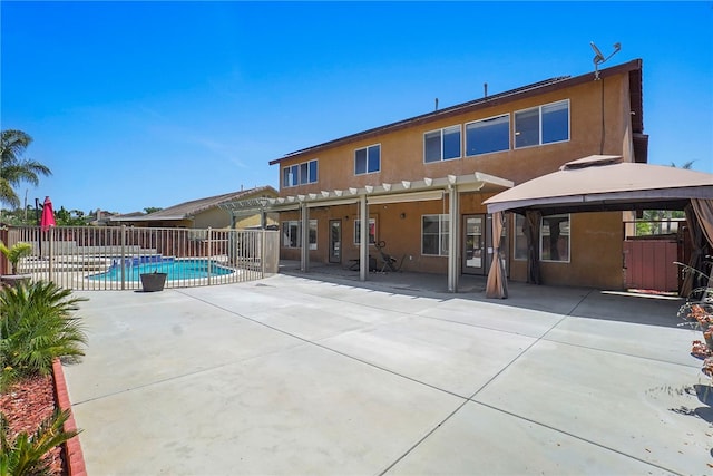 35887 Rhone Ln, Winchester, CA 92596 - rear view of house with stucco siding, a gazebo, a pergola, and a patio