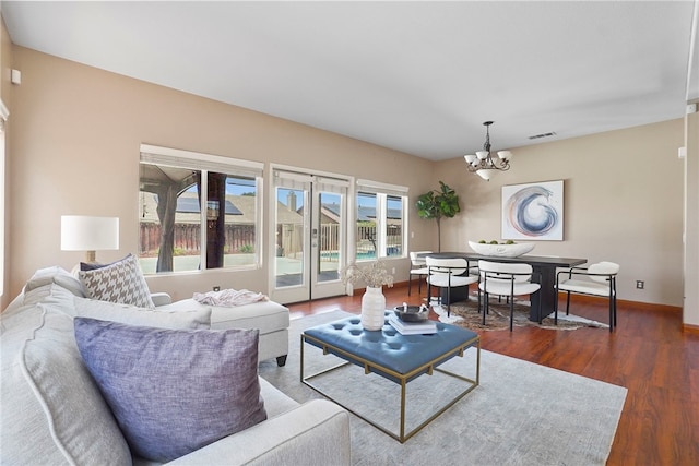 35887 Rhone Ln, Winchester, CA 92596 - living room featuring a chandelier and wood finished floors