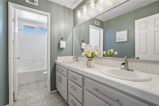 35887 Rhone Ln, Winchester, CA 92596 - full bathroom with double vanity, tile patterned floors, and washtub / shower combination