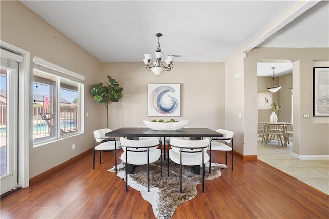 35887 Rhone Ln, Winchester, CA 92596 - dining area featuring a chandelier and wood finished floors