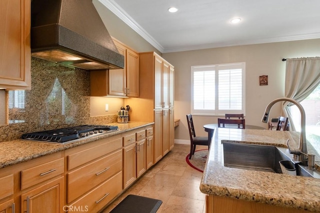 34214 Pinehurst Dr, Yucaipa, CA 92399 - kitchen with wall chimney exhaust hood, stainless steel gas cooktop, crown molding, backsplash, and recessed lighting