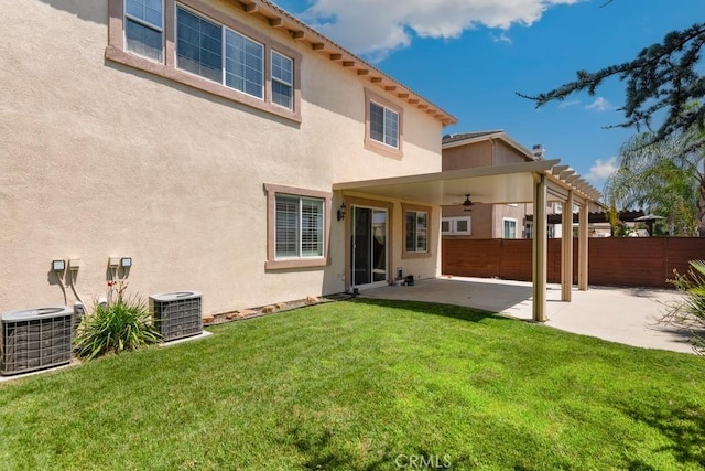 34214 Pinehurst Dr, Yucaipa, CA 92399 - rear view of house with ceiling fan, a patio area, and stucco siding