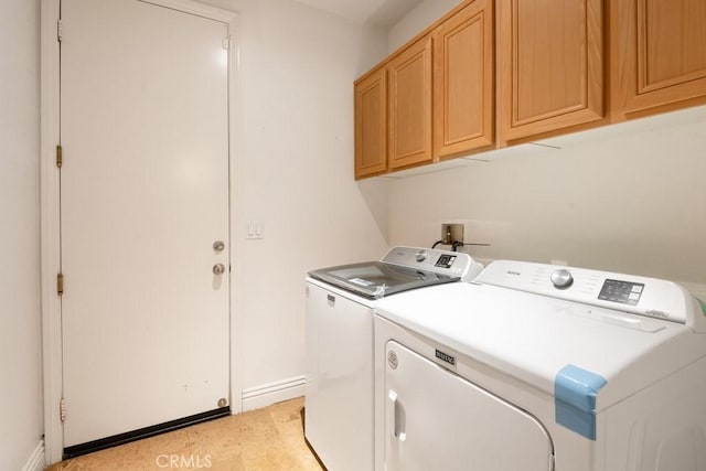 34214 Pinehurst Dr, Yucaipa, CA 92399 - laundry area featuring washing machine and clothes dryer and cabinet space