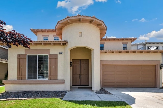 34214 Pinehurst Dr, Yucaipa, CA 92399 - mediterranean / spanish-style home with stucco siding, driveway, an attached garage, and a tiled roof