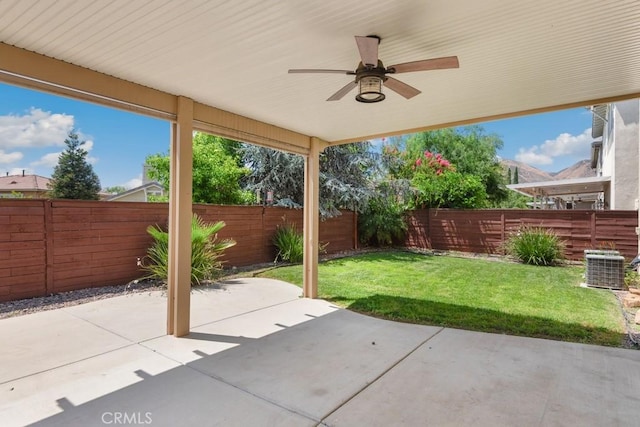 34214 Pinehurst Dr, Yucaipa, CA 92399 - fenced backyard with a patio area and a ceiling fan