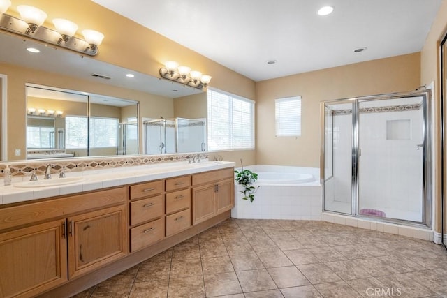 34214 Pinehurst Dr, Yucaipa, CA 92399 - full bath featuring double vanity, a bath, a stall shower, tile patterned flooring, and recessed lighting