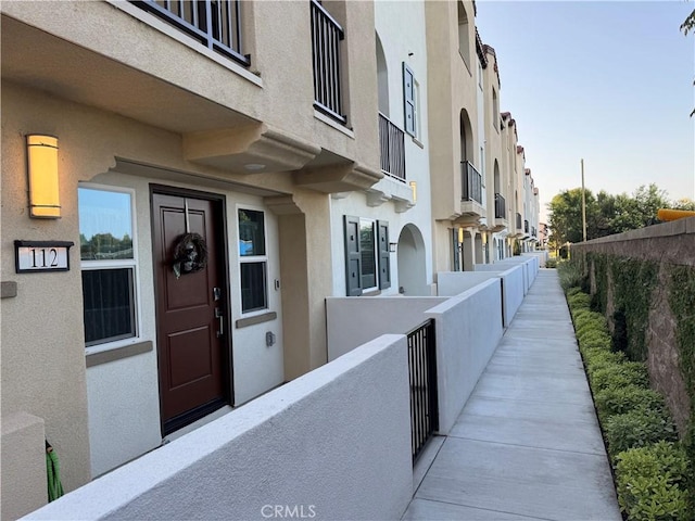 2750 W 182nd St Unit 112, Torrance, CA 90504 - view of exterior entry featuring stucco siding and a residential view