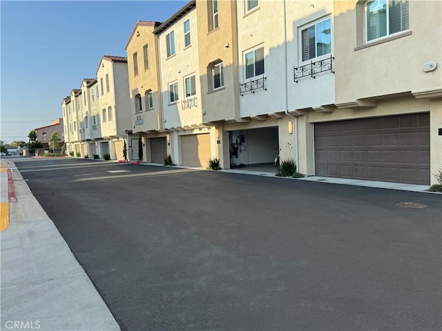 2750 W 182nd St Unit 112, Torrance, CA 90504 - view of property with a residential view and a garage