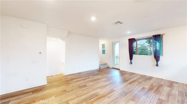 2750 W 182nd St Unit 112, Torrance, CA 90504 - empty room featuring light wood-style flooring, stairs, and recessed lighting