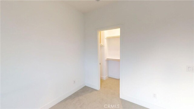 2750 W 182nd St Unit 112, Torrance, CA 90504 - empty room featuring light colored carpet and baseboards