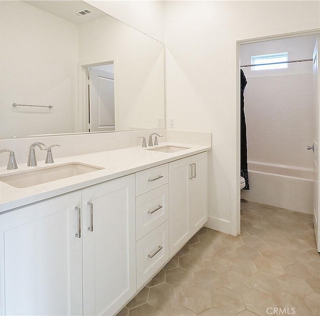 2750 W 182nd St Unit 112, Torrance, CA 90504 - bathroom with double vanity, shower / bathtub combination with curtain, and tile patterned flooring