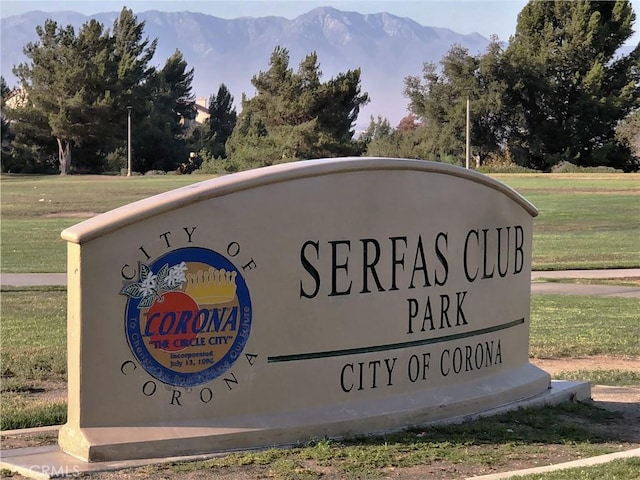 2802 Green River Rd Unit 101, Corona, CA 92882 - community / neighborhood sign with a lawn and a mountain view